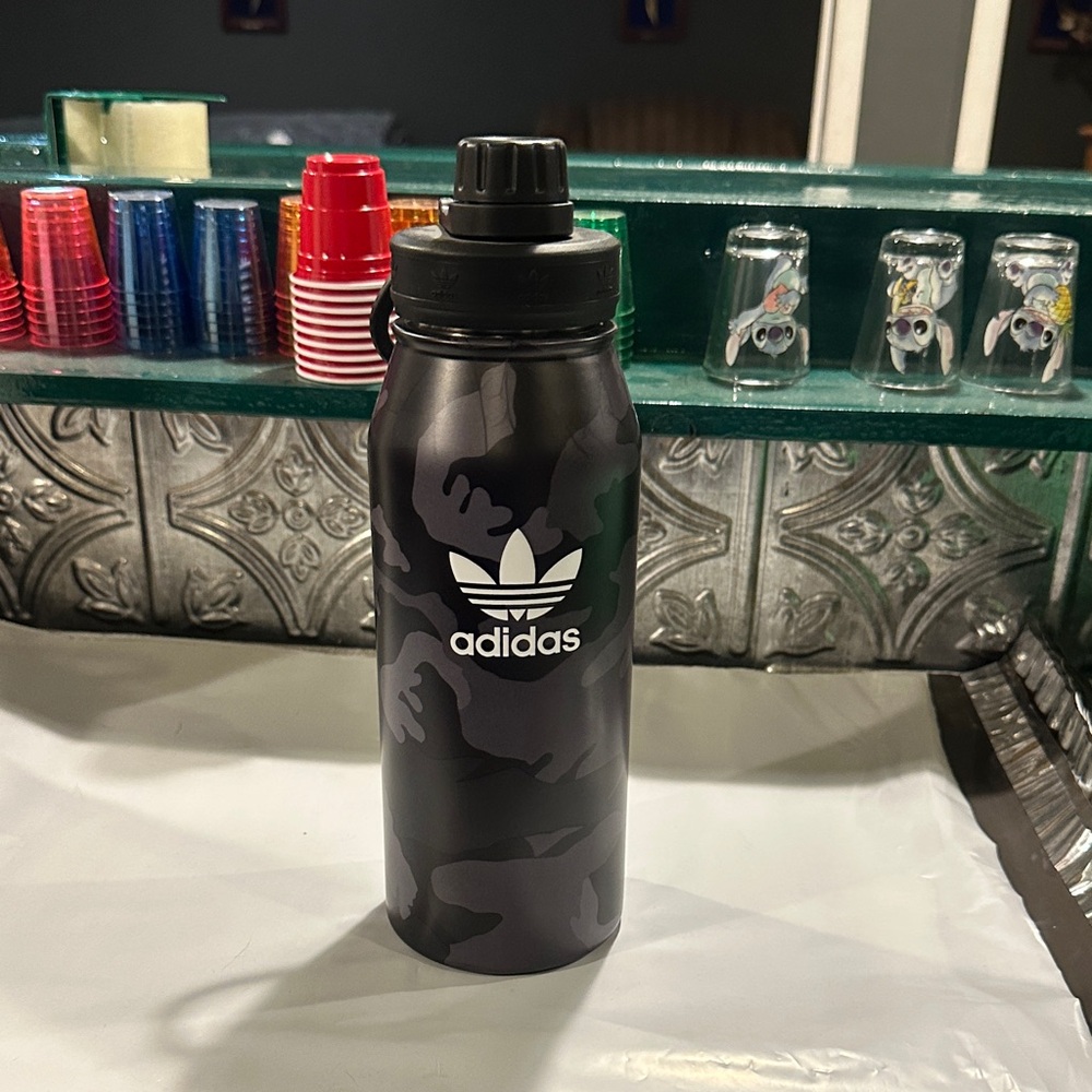 Adidas Black and Gray Camouflage Bottle. BRAND NEW AND NEVER USED